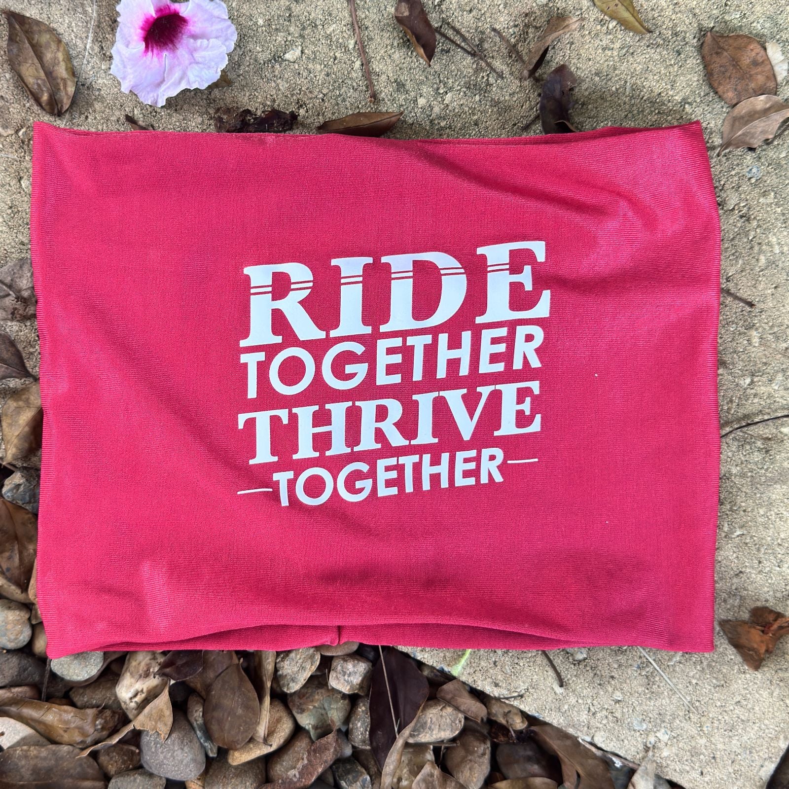 Cycling snood with “Ride Together, Thrive Together” print, red colour