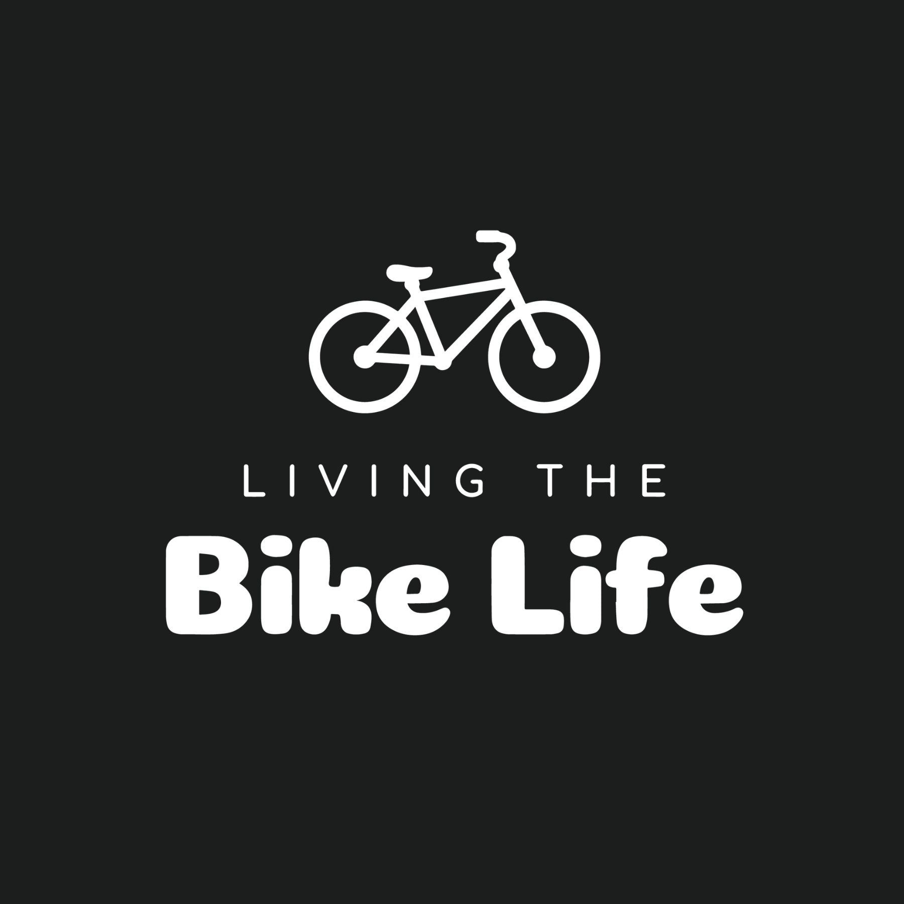 Close-up of white slogan and bike graphic on black cycling t-shirt