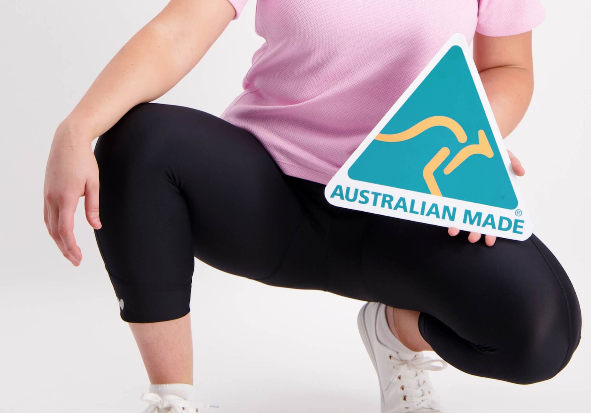 Person wearing black pants with an 'Australian Made' sign overlay