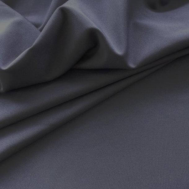 Close-up of soft, breathable fabric showcasing texture for women's padded pocket bike shorts pebble.