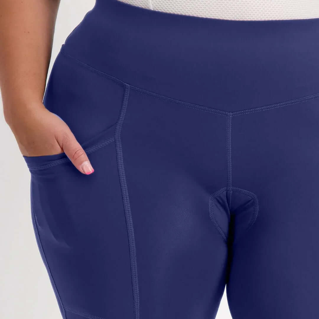 Women's pocket padded bike shorts bay worn by cyclist, front view