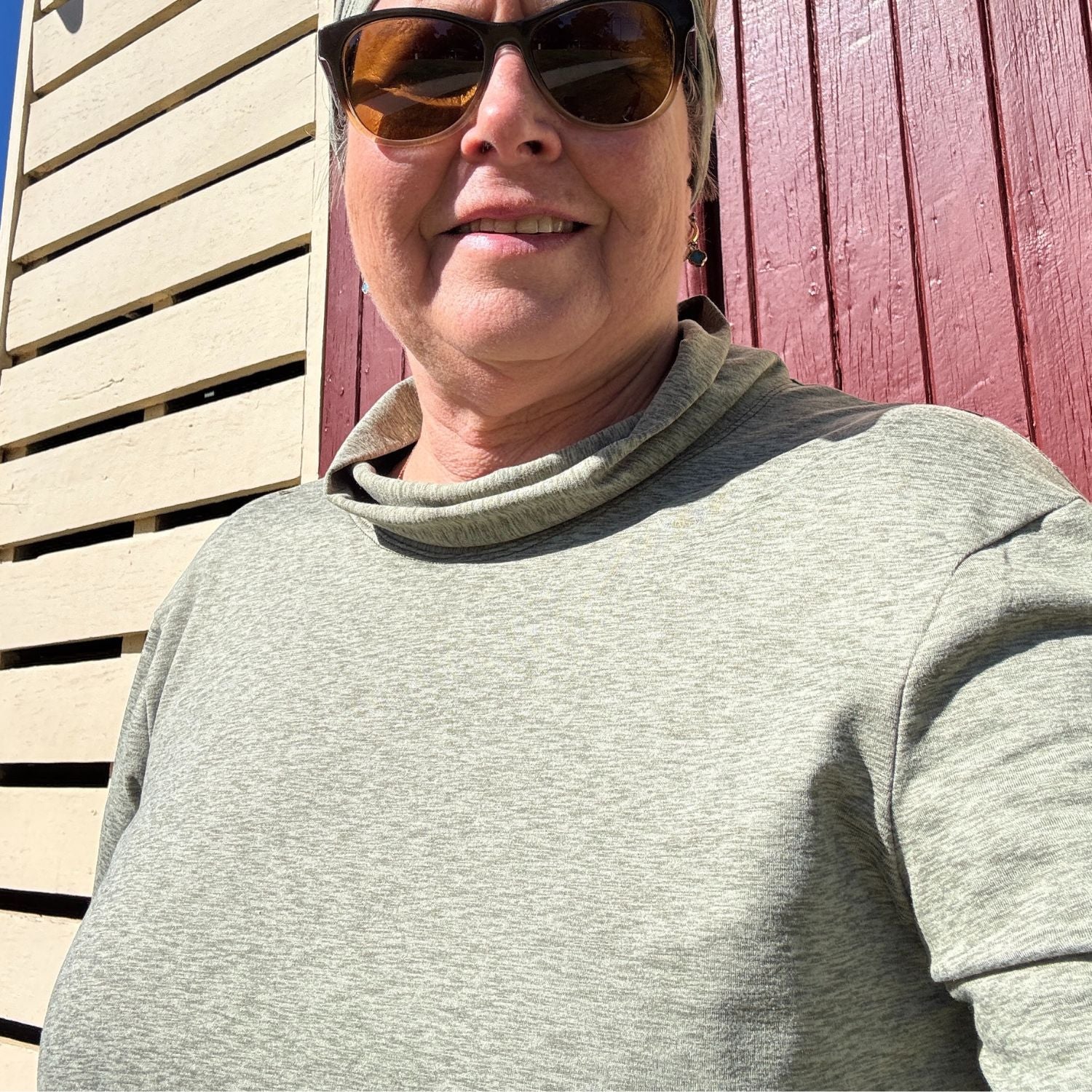 Model wearing Nomad Skivvy layered under jacket for cycling