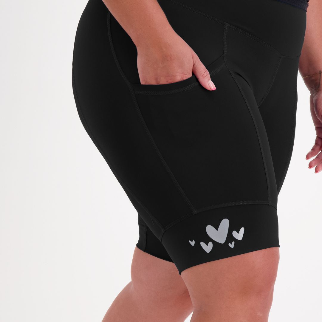 Smartphone stored securely in pocket during women’s cycling ride