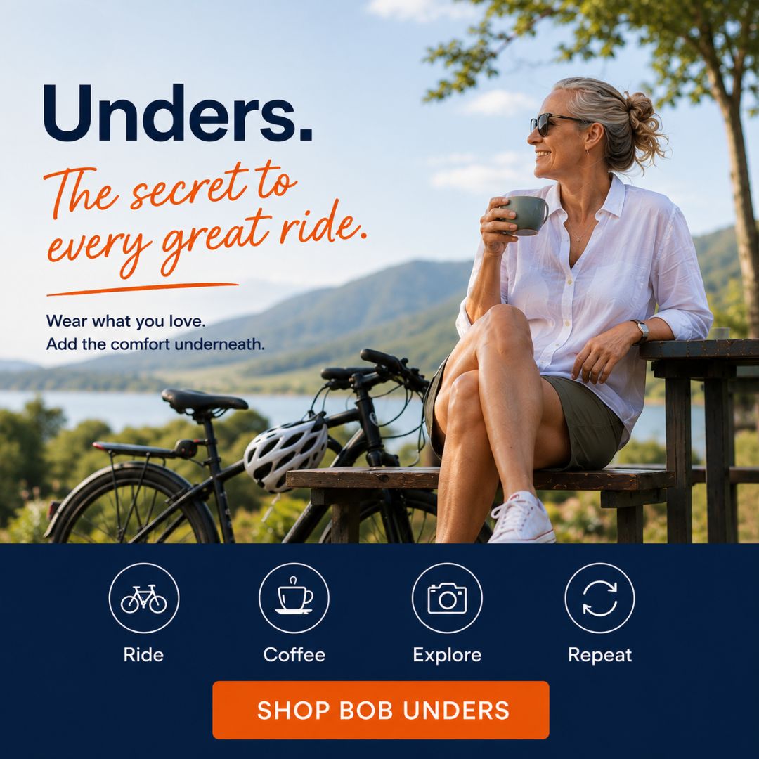 Outdoor promotional graphic with a woman sitting on a wooden bench by a lake, wearing a white button-up shirt and shorts, with a bicycle beside her. Large text reads 'Unders.