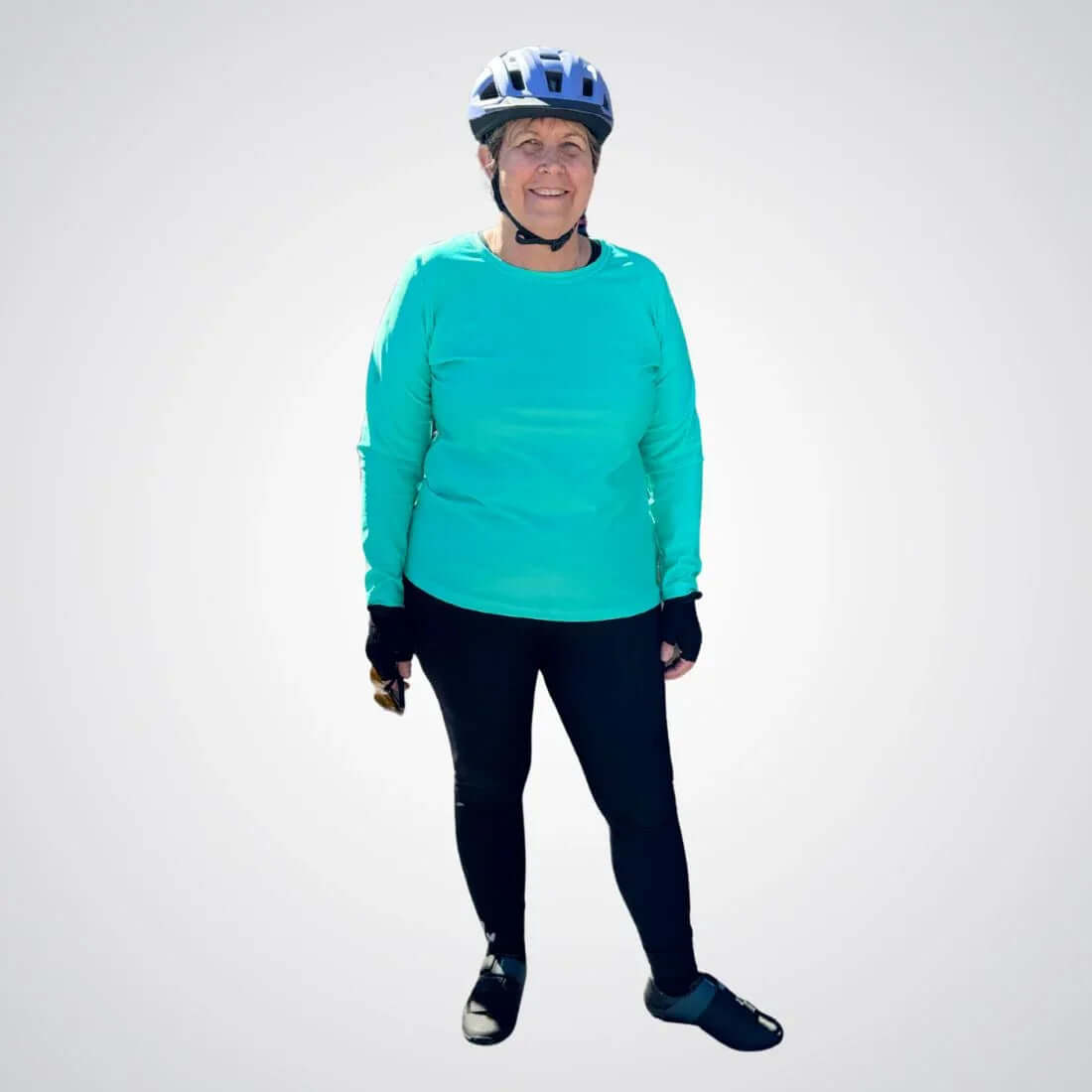 Padded thermal cycling tights worn by cyclist, front view