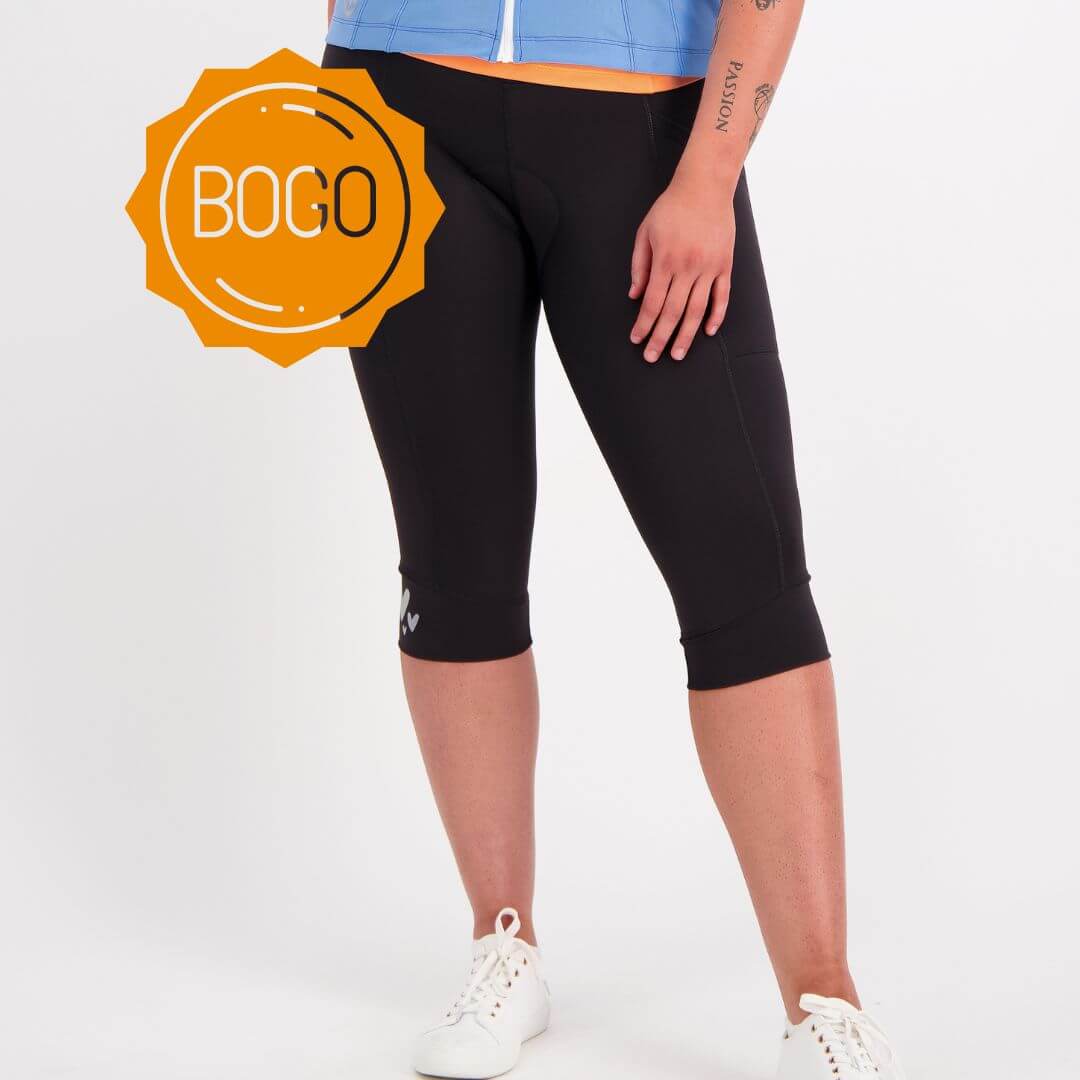 Person wearing black capri cycling leggings with a BOGO badge on a white background