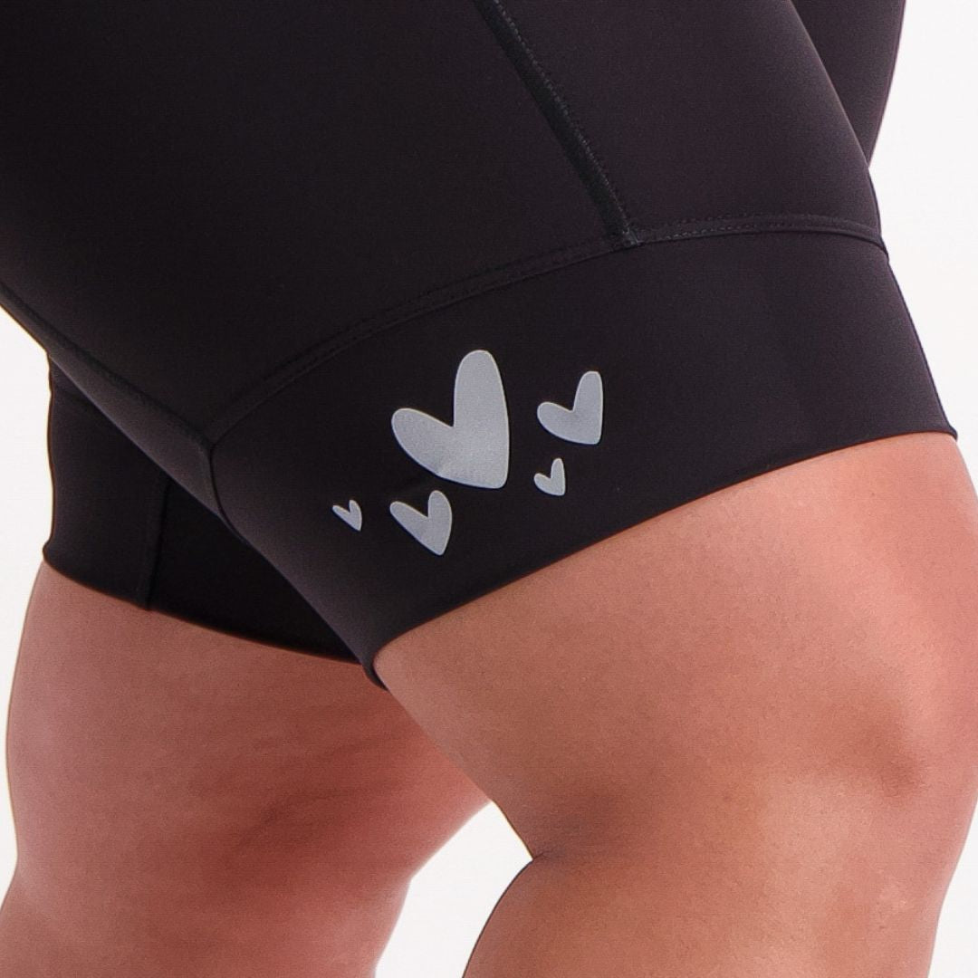 Power Pocket Bib Shorts featuring moisture-wicking fabric, wide leg bands, and seamless inside leg.