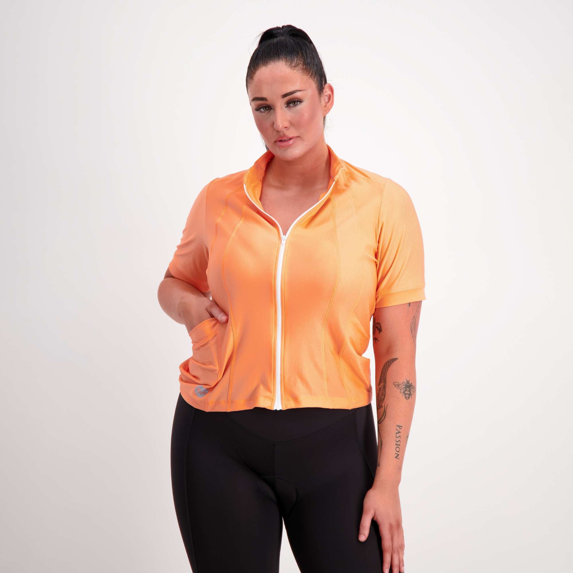 Orange short sleeve women's cycling jersey front view on model