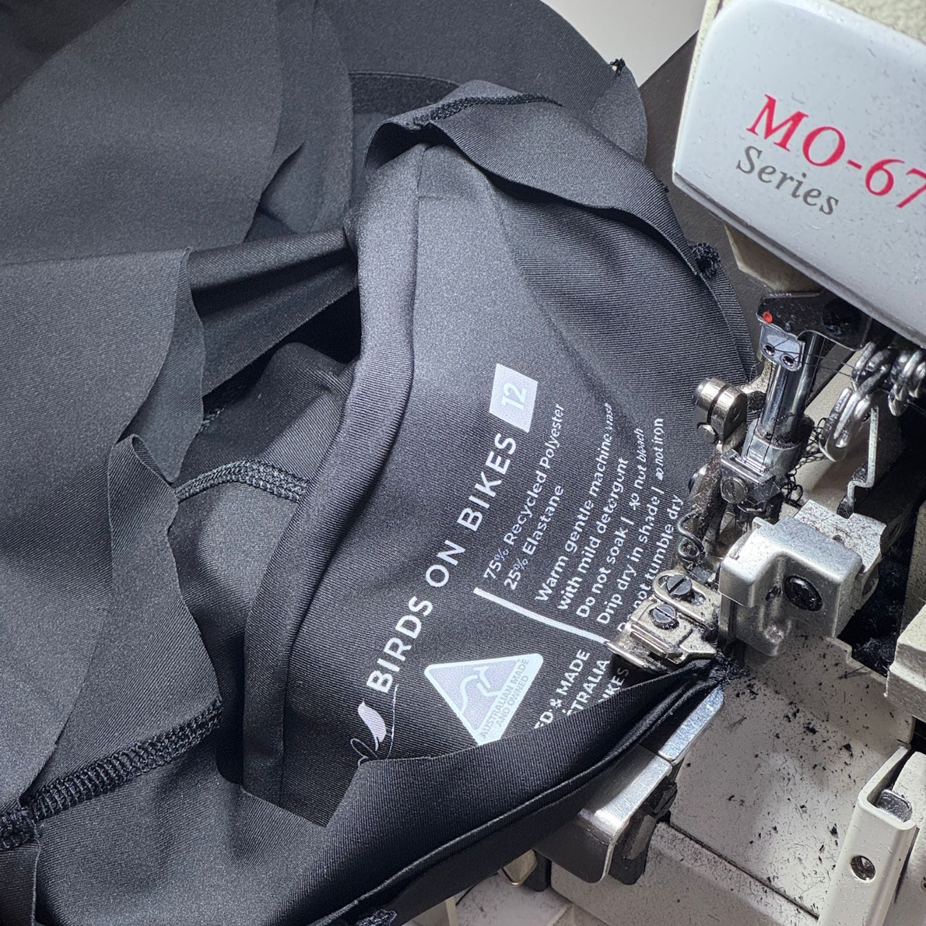 Women’s padded bike shorts being sewn in the Birds on Bikes Brisbane studio