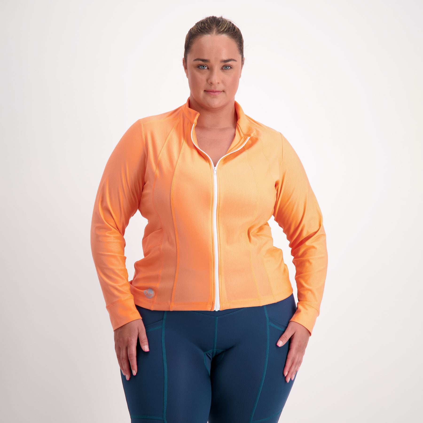 Female cyclist in orange Long sleeve cycling jersey 