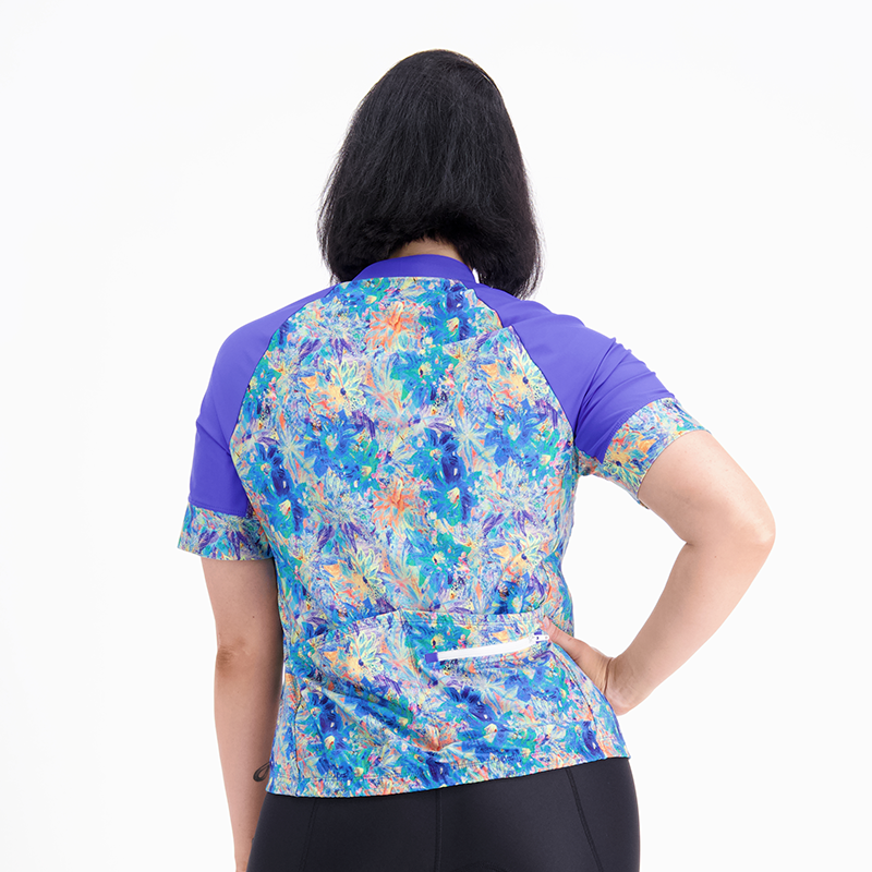 side view of Artsy Floral blue short sleeve cycling jersey 